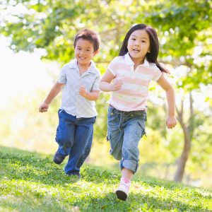children running through the park powerstone property management